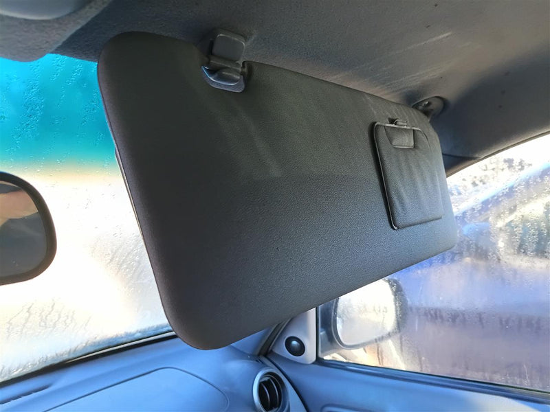 Used OEM Passenger Side Right Sun Visor from 2003 Toyota RAV4