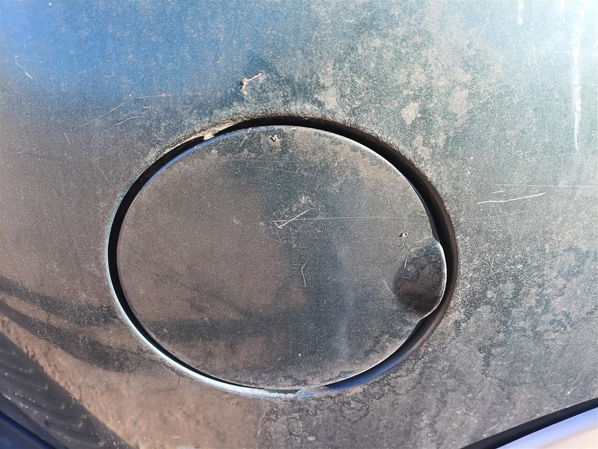 Used OEM Fuel Filler Gas Door Lid from 2001 Ford F150