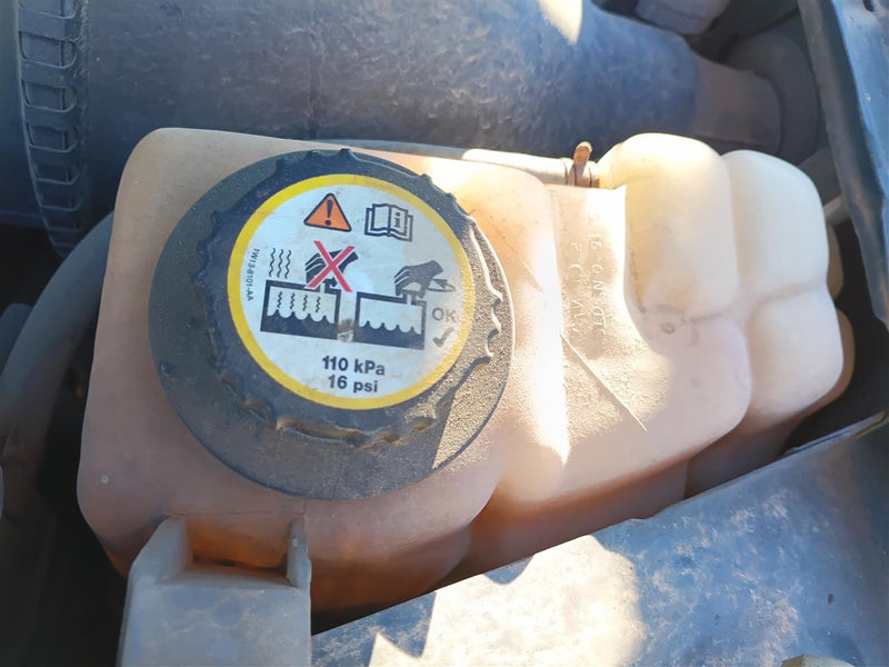 Used OEM Coolant Overflow Reservoir Tank from 2001 Ford F150