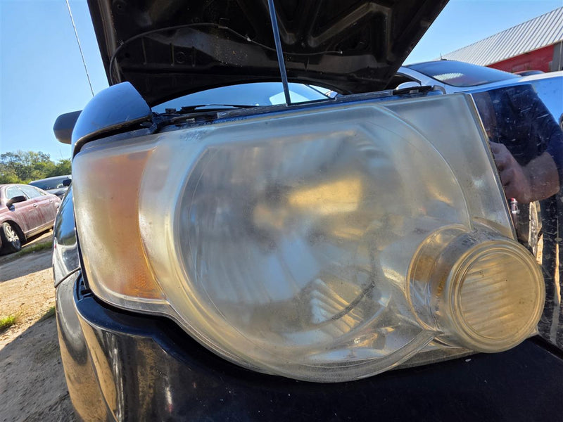 Used OEM Passenger Side Right Headlight Headlamp Assembly from 2008 Ford Escape