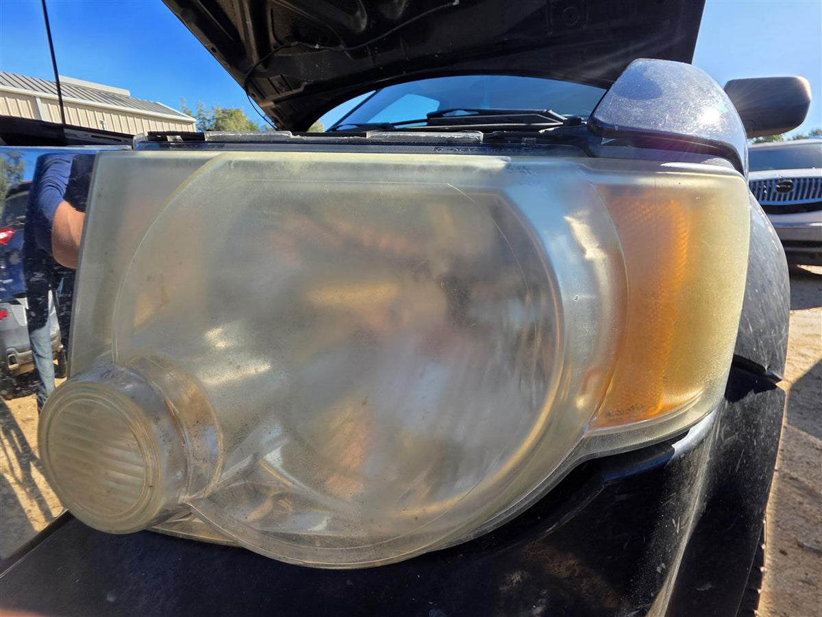 Used OEM Driver Side Left Headlight Headlamp Assembly from 2008 Ford Escape