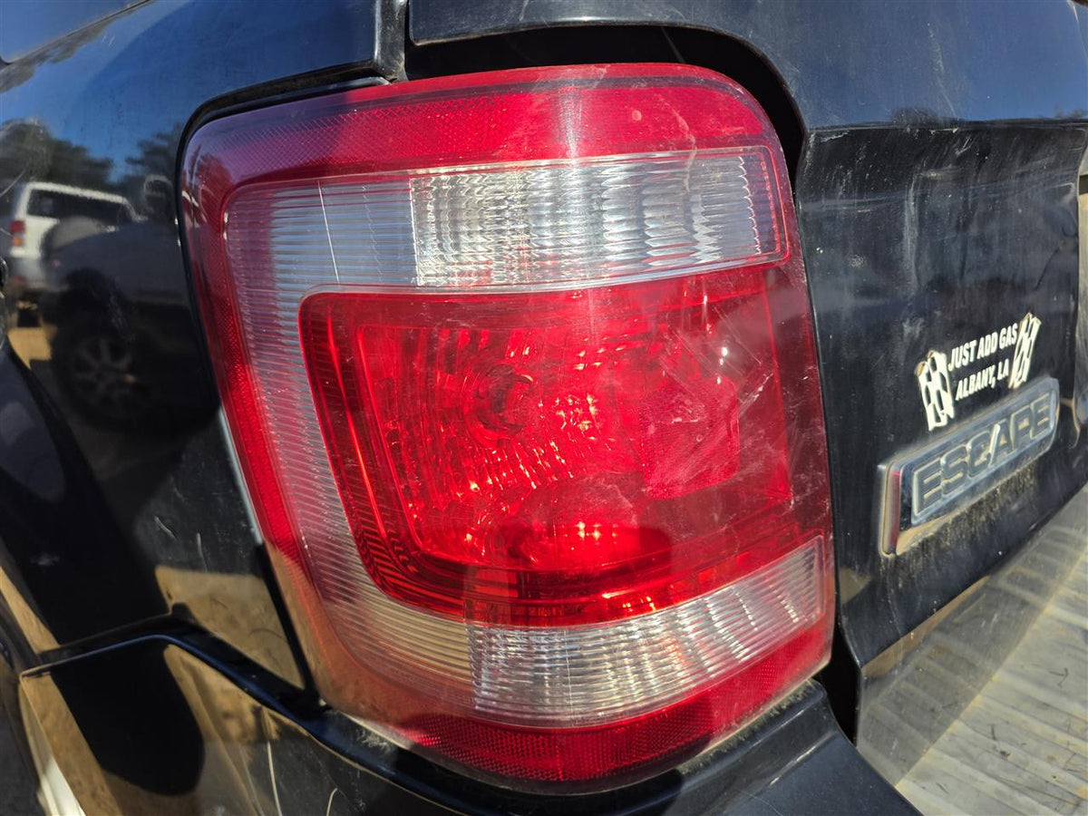 Used OEM Driver Side Left Tail Light Lamp Assembly from 2008 Ford Escape