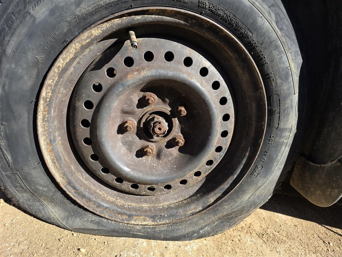 Used OEM Wheel Rim from 1996 Jeep Voyager