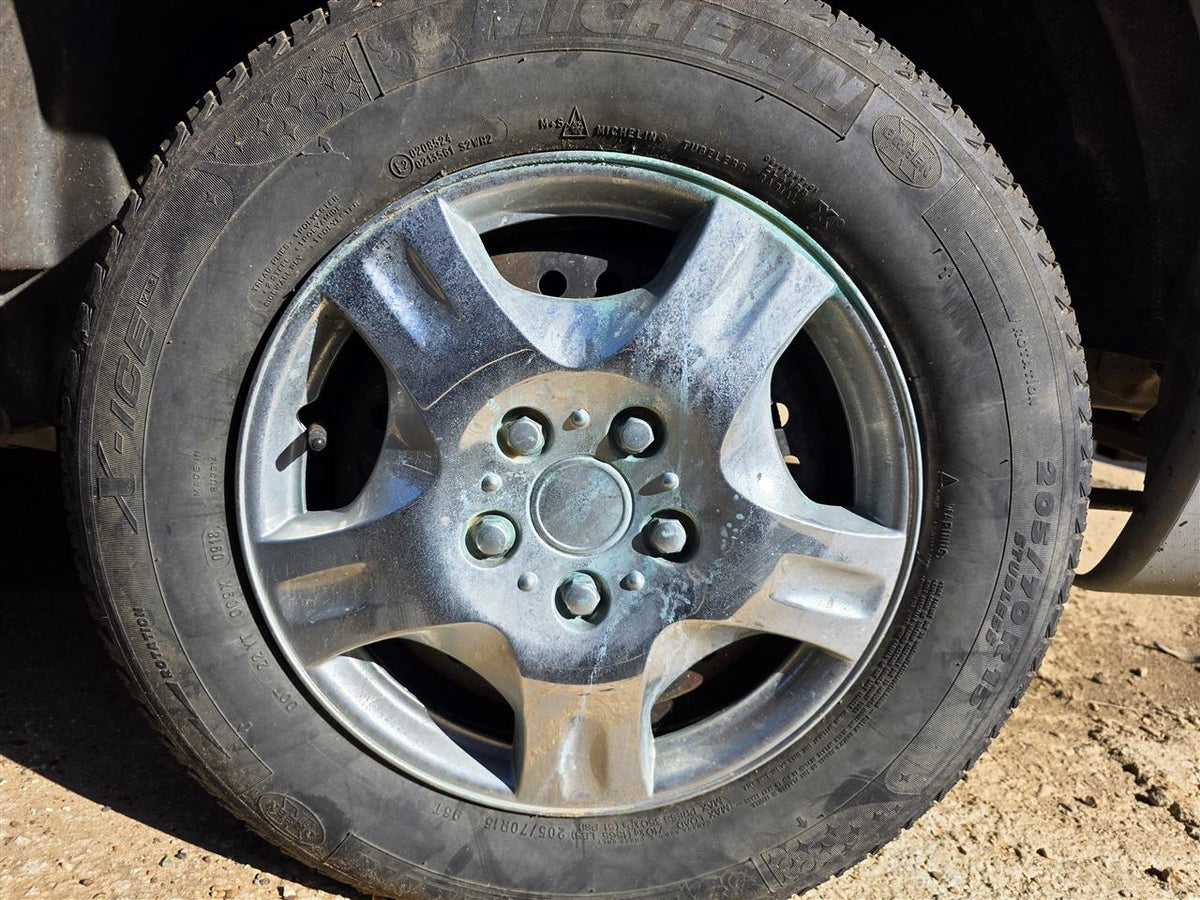Used OEM Wheel Rim from 1996 Jeep Voyager