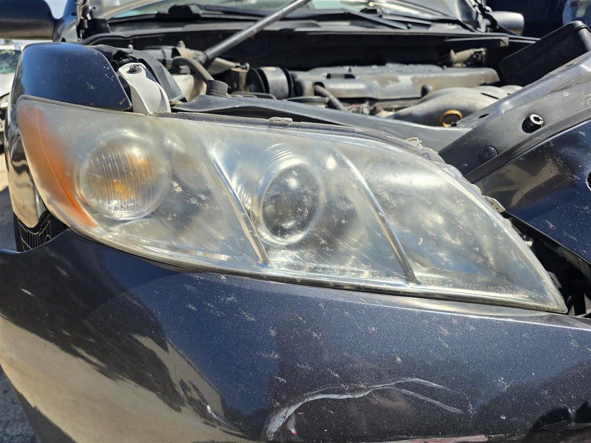 Used OEM Passenger Side Right Headlight Headlamp Assembly from 2007 Toyota