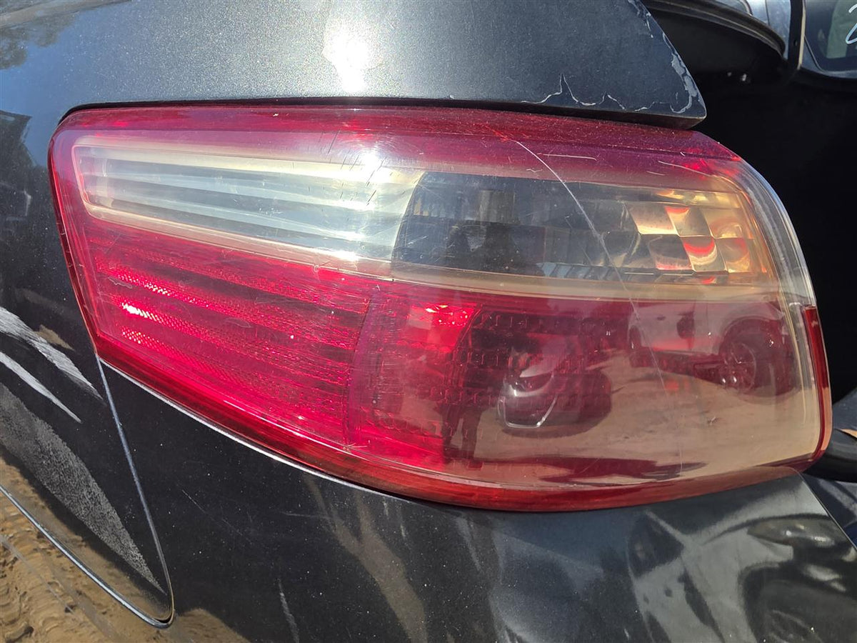 Used OEM Driver Side Left Tail Light Lamp Assembly from 2007 Toyota