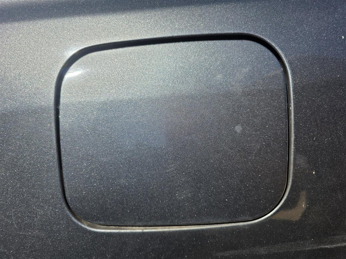 Used OEM Fuel Filler Gas Door Lid from 2007 Toyota