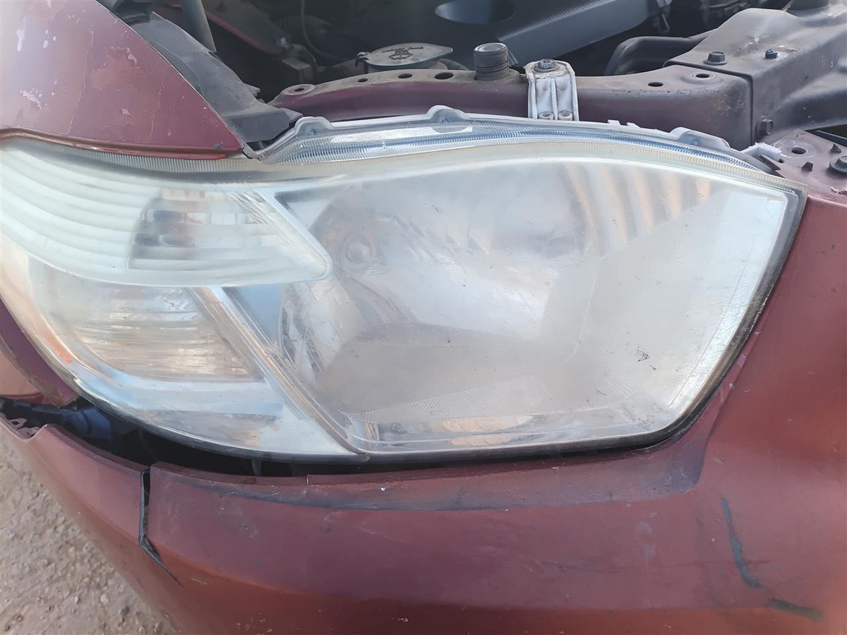 Used OEM Passenger Side Right Headlight Headlamp Assembly from 2009 Toyota Highlander