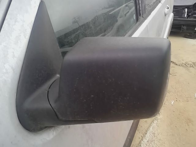 2006 thru 2010 Ford Explorer Left Driver Side View Door Mirror Power folding black textured cover with approach lamps